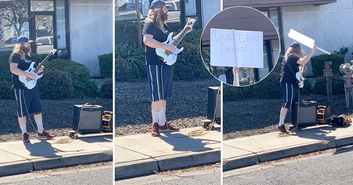 uomo che suona la chitarra